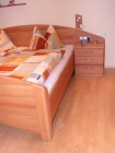 Doppelbett in Buche
